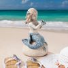 Little Girl Mermaid Holding Shell